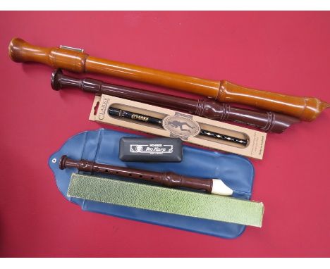 Three Recorders including tenor and descant, a Hohner Pro Harp harmonica and a Clarke tin whistle 