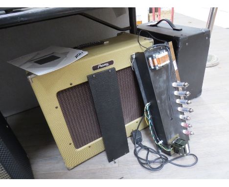 A Peavey Delta Blues guitar amplifier, tweed coloured case, disassembled 