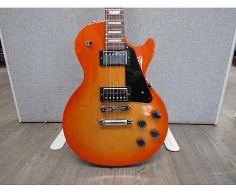 A 2021 Gibson Les Paul Studio electric guitar in Tangerine Burst, model number LPSTCCTNCH1, serial number 222310039, with Gib