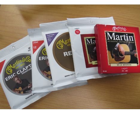 Five sets of Martin guitar strings including Eric Clapton MEC12 Light 12's 