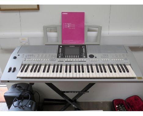 A Yamaha PSR-S910 Digital Workstation keyboard with stand, manual and accessories 