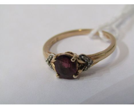GARNET RING, 10ct yellow gold ring, central garnet with diamonds to each shoulder, size J/K 