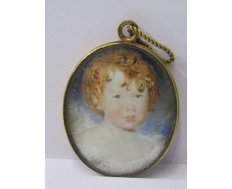GEORGIAN MINIATURE, Georgian oval miniature portrait of a red haired child in a gilt metal floral decorated mount, 4cm diamet