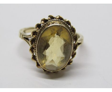 9CT YELLOW GOLD VINTAGE STYLE CITRINE RING, large oval cut multi facetted citrine in heavy 9ct yellow gold mount, 