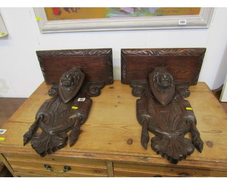 BRACKET SHELVES, pair of antique carved oak bracket supports with lion mask supports, 19" height 