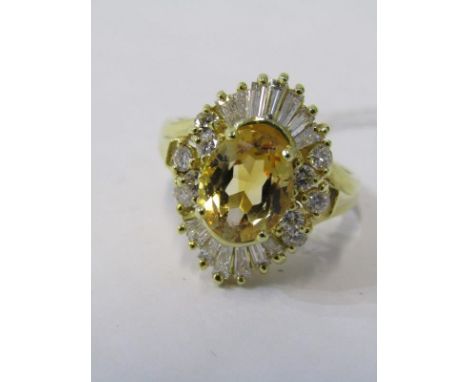 18ct GOLD CITRINE &amp; DIAMOND CLUSTER RING, oval citrine surrounded by baguette and brilliant round cut diamonds on an 18ct