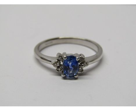 18CT WHITE GOLD SAPPHIRE &amp; DIAMOND CLUSTER RING, principal oval cut sapphire of good colour, set between 6 well matched b