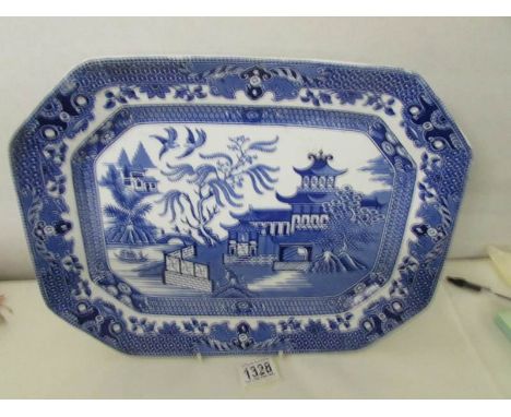 A blue and white willow pattern meat platter,