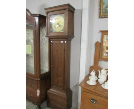 An oak Grandfather clock with brass dial marked Willm Harris, Chippenham.