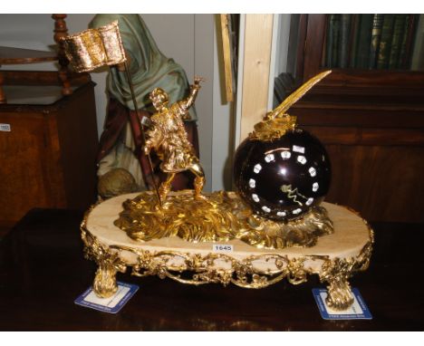 A large fabulous gilded brass and Shakespeare ball clock with quartz movement.