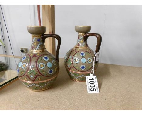 A pair of Edwardian Sarreguemines pottery jugs of Aesthetic design, stamped 1300.