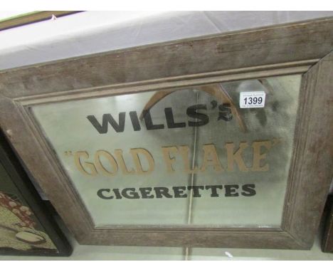 A Will's gold flake cigarettes mirror.