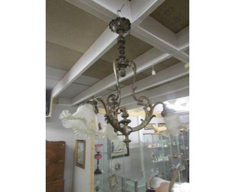 An ornate 3 lamp ceiling light,.
