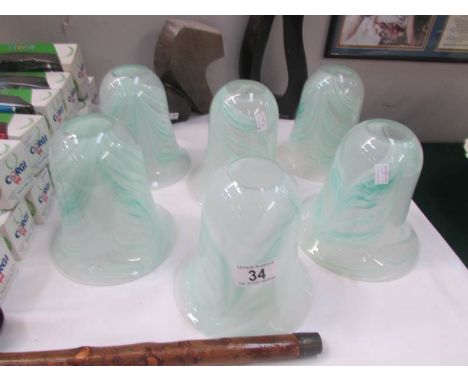 A set of 6 heavy glass lamp shades.