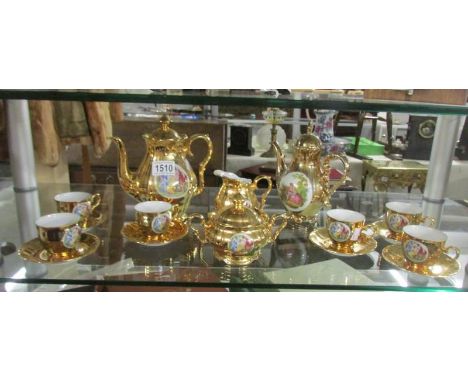 A fine gold decorated Czechoslovakian tea set with 'Renaissance scene'.