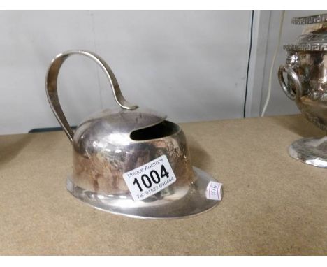 A Hukin & Heath Christopher Dresser design silver plate helmet shaped spoon warmer.