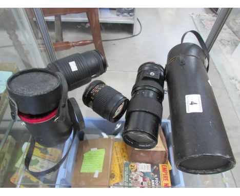 3 camera lenses (2 with cases).