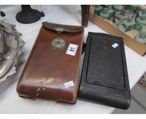 A Kodak folding camera in case.