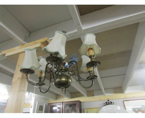 A 6 lamp brass ceiling light.