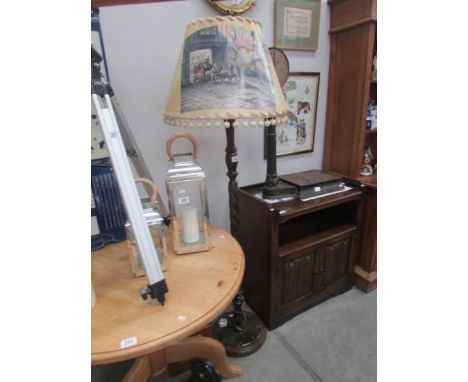 A standard lamp with shade.