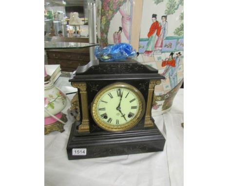 An America slate mantel clock marked on mechanism 'Ansonia Clock Co., USA, New York.'