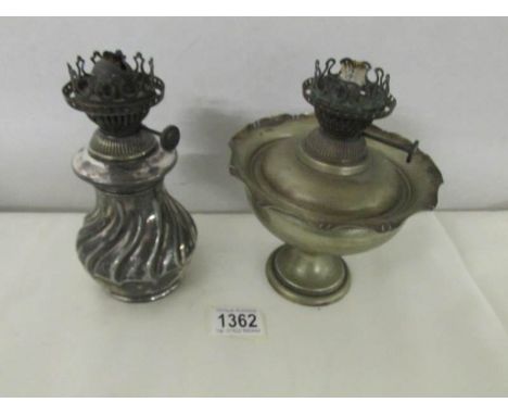 A Hink's oil lamp and one other.