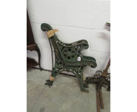 A pair of cast iron bench ends.