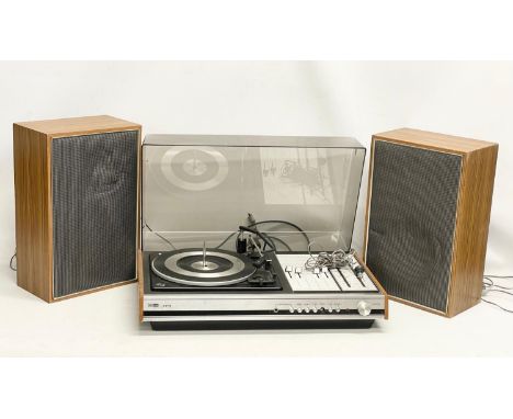 A vintage ITT KB 2010 record player with speakers. 63x41x21cm. Speakers measure 29x18x46cm 