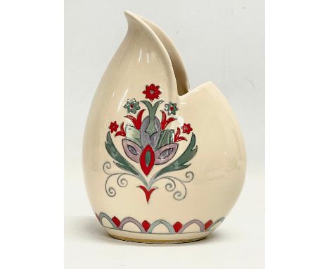 A Charlotte Rhead jug. Designed for Crown Ducal. 15x21cm 