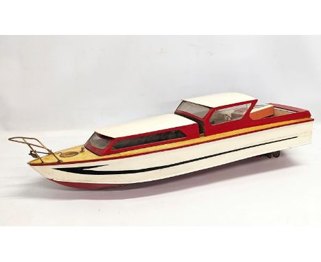 A good quality vintage handmade remote controlled  wooden boat. 90x27x26cm 