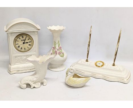 5 pieces of Belleek pottery including mantle clock, vase, etc. 