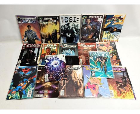 A collection of vintage comic books including Batman, Superman, Star Wars, etc. 