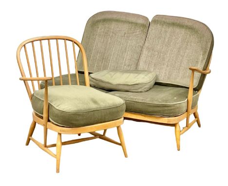 A 2 piece Ercol Blonde Elm Mid Century suite. 