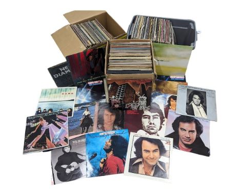 A collection of vintage vinyl records and LPs, including Neil Diamond, Celine Dion, John Denver, etc 