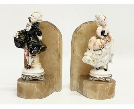 A pair of vintage onyx and pottery bookends. 8.5x15.5cm 