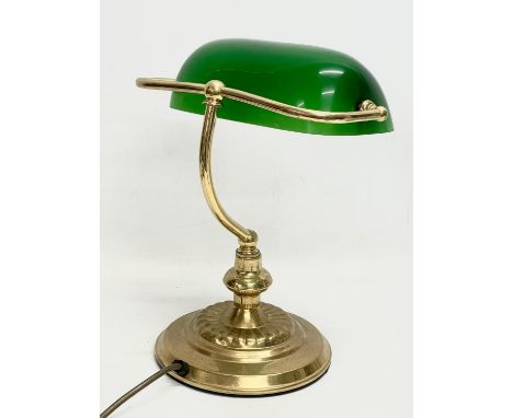 A brass desk lamp with glass shade. 28x35cm 