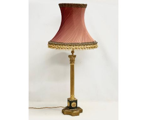 A tall good quality gilt brass table lamp with Corinthian style pillar. Base measures 18x63cm. 