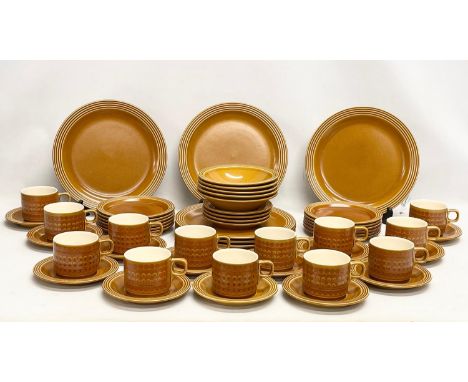 A 53 piece vintage Hornsea ‘Saffron’ tea and dinner set. 6 dinner plates. 12 sandwich plates. 5 bowls. 13 cups. 17 saucers. 