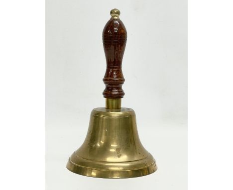 A vintage brass bell. 15x25cm. 