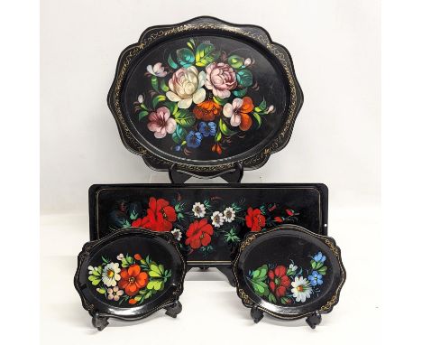 A quantity vintage lacquered trays. Largest measures 38x31cm 
