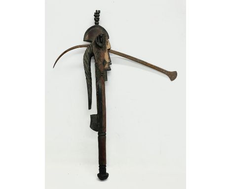 A West African ceremonial tribal axe. 54cm 