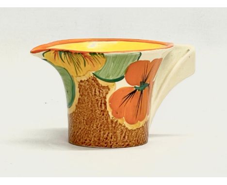 A 1920’s Clarice Cliff Bizarre Nasturtium milk jug. Art Deco. 11x8x6cm. 