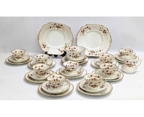 A 36 piece vintage Diamond tea set, including 2 cake plates. 