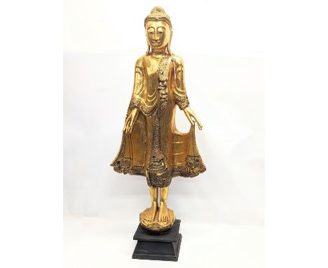A large gilded Burmese Buddha statue. 114cm 