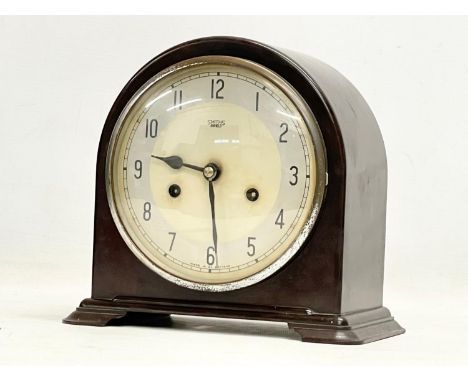 A vintage Art Deco Bakelite mantle clock by Smiths Enfield. With key and pendulum. 22x12x20cm 