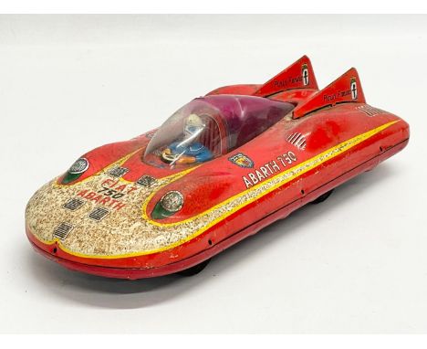 A vintage Fiat Abarth 750 tin plate toy. Japan. 26cm 