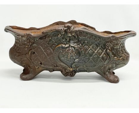A vintage cast iron planter. 44x21x21cm 