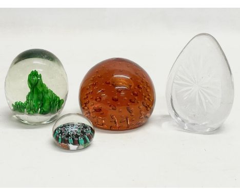 4 Art Glass paperweights. 