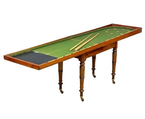 A Victorian mahogany Bagatelle table. 