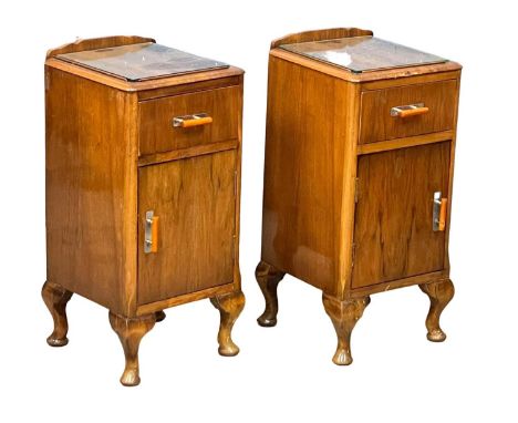 A pair of vintage Walnut bedside cabinets with glass insert tops. 33x34x64cm. 